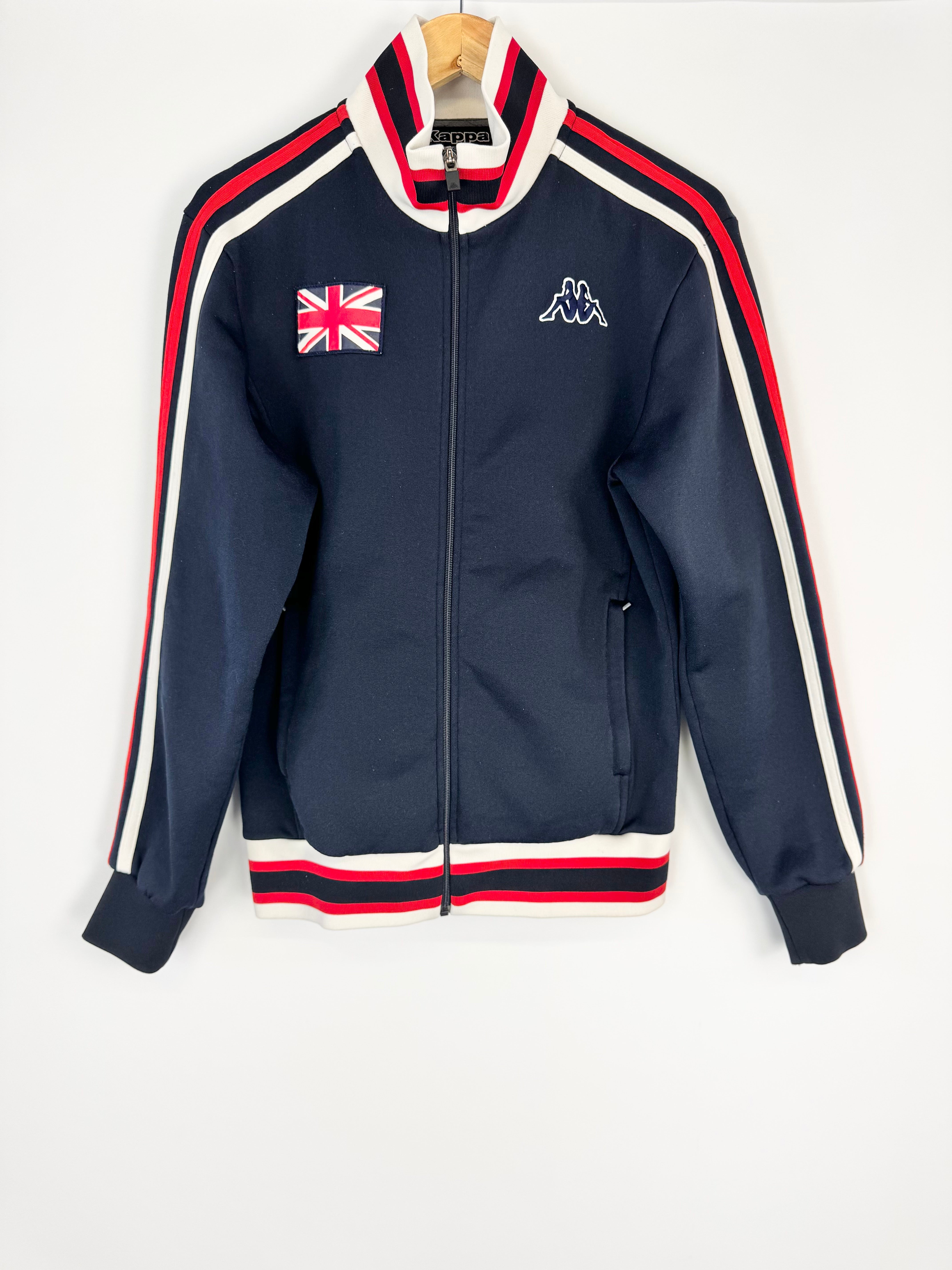 Navy tracksuit jacket with Union Jack and brand logo on a white background