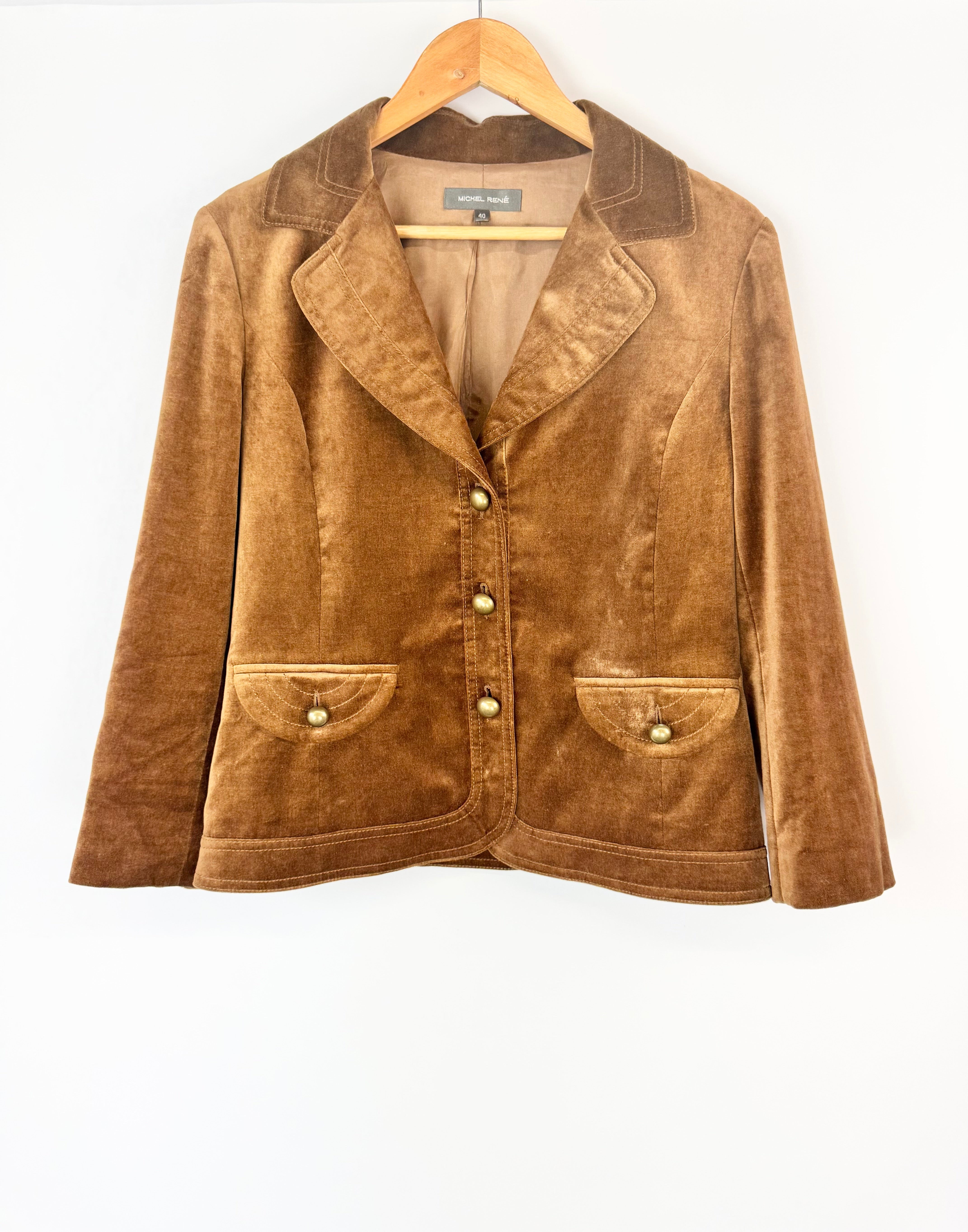 Brown jacket on a hanger against a white background