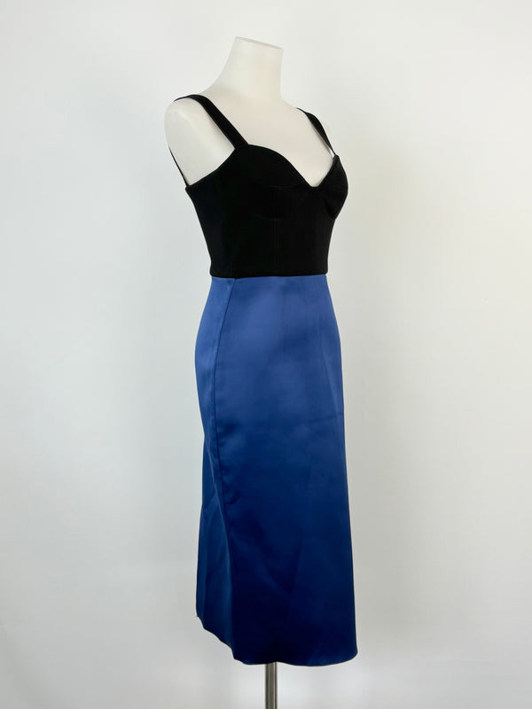 A Yeojin Bae black and navy blue two-tone strap dress displayed on a mannequin, showing a fitted silhouette with a bonded satin skirt.